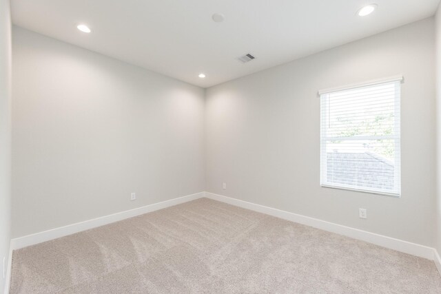 3312 Bremond St, Houston, TX 77004 - unfurnished room with light carpet, baseboards, and recessed lighting