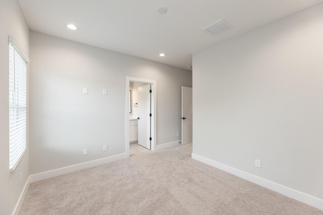 3312 Bremond St, Houston, TX 77004 - spare room with light colored carpet, recessed lighting, and baseboards