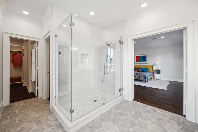 712 E 14th St, Houston, TX 77008 - bathroom featuring recessed lighting, a spacious closet, a shower stall, and connected bathroom