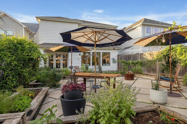 712 E 14th St, Houston, TX 77008 - back of house with a patio area, outdoor dining space, and fence