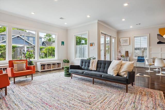 712 E 14th St, Houston, TX 77008 - living room featuring wood finished floors, ornamental molding, and recessed lighting