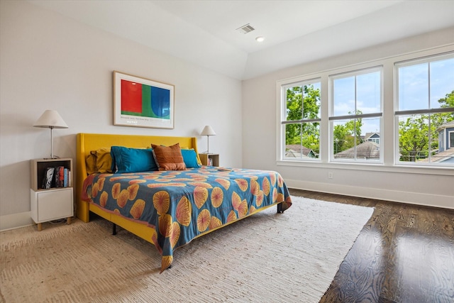 712 E 14th St, Houston, TX 77008 - bedroom featuring baseboards and wood finished floors