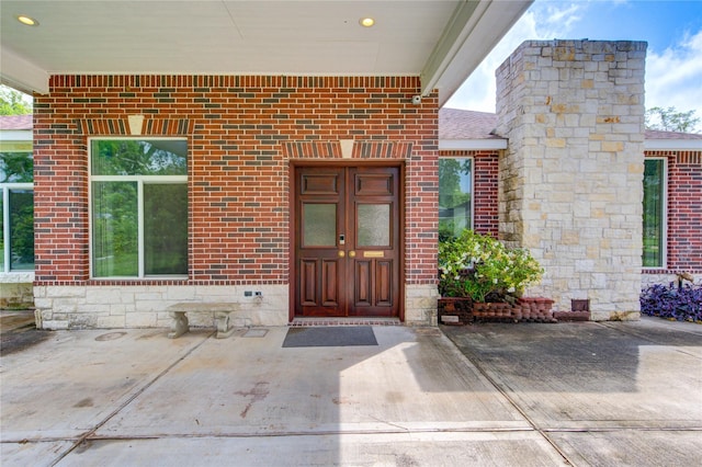 931 Strange Dr, Richmond, TX 77406 - doorway to property with brick siding