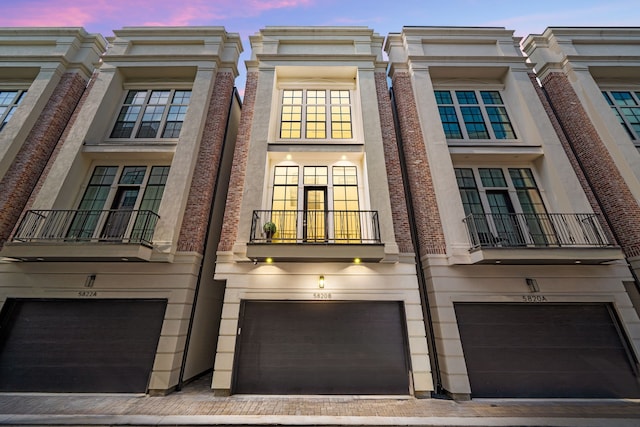 5820 Winsome Ln Unit B, Houston, TX 77057 - view of front of house featuring a balcony and an attached garage