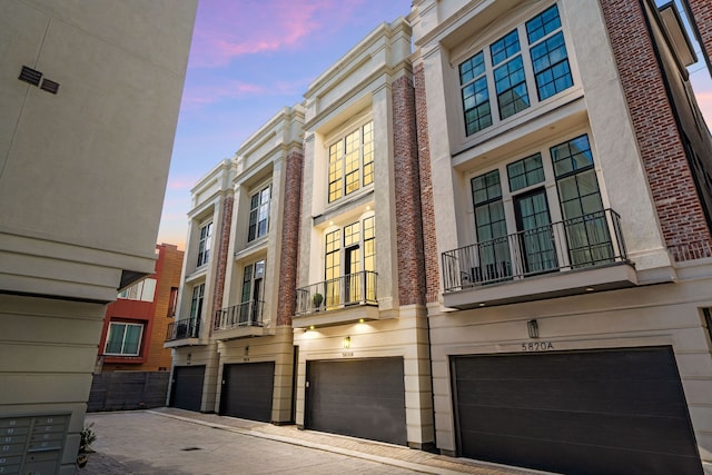 5820 Winsome Ln Unit B, Houston, TX 77057 - property at dusk featuring a garage