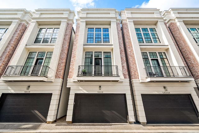 5820 Winsome Ln Unit B, Houston, TX 77057 - view of side of property featuring a garage and a balcony