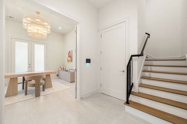 5820 Winsome Ln Unit B, Houston, TX 77057 - foyer with a chandelier, stairs, baseboards, and french doors