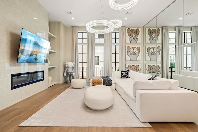 5820 Winsome Ln Unit B, Houston, TX 77057 - living area featuring wood finished floors and a tile fireplace