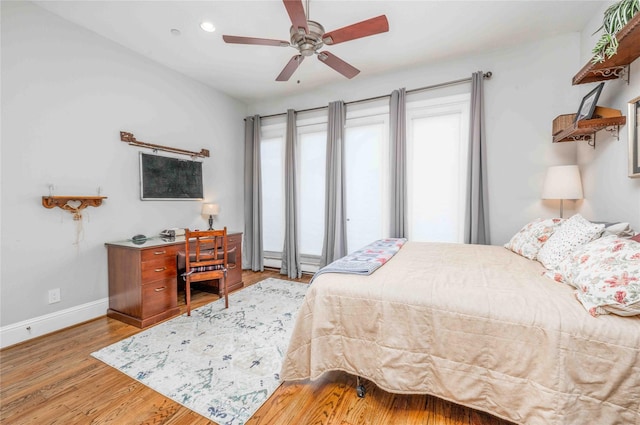 2110 Mason St, Houston, TX 77006 - bedroom featuring wood finished floors, baseboards, recessed lighting, and a ceiling fan