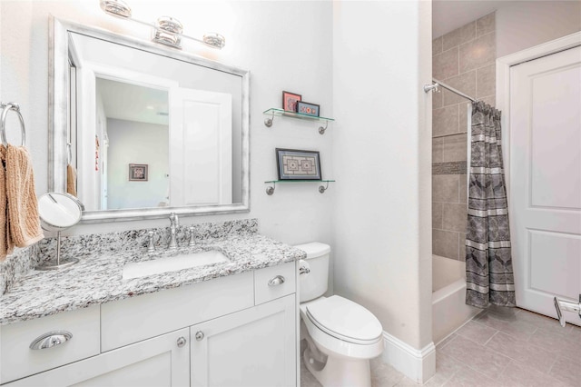 2110 Mason St, Houston, TX 77006 - full bathroom with toilet, vanity, tile patterned floors, shower / bath combination with curtain, and baseboards