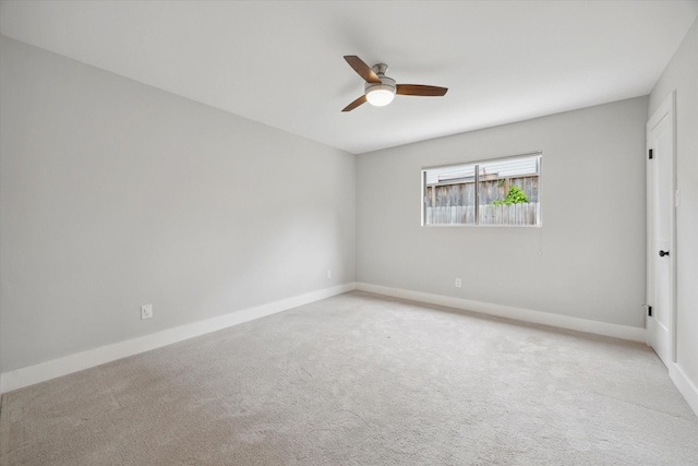 625 Rancho Bauer Dr, Houston, TX 77079 - empty room featuring a ceiling fan, light carpet, and baseboards