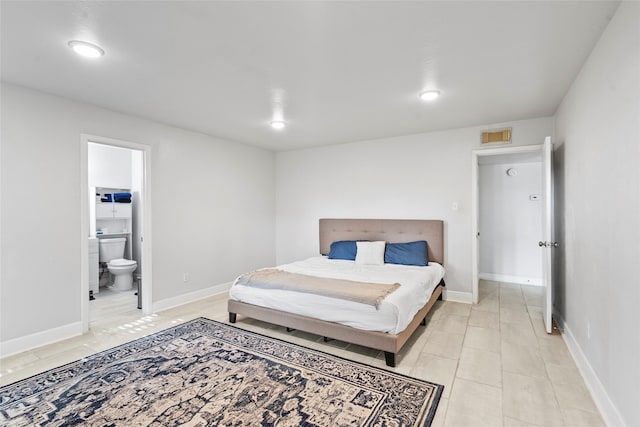 2219 Anthony Hay Ln, Katy, TX 77449 - bedroom featuring connected bathroom, recessed lighting, and baseboards