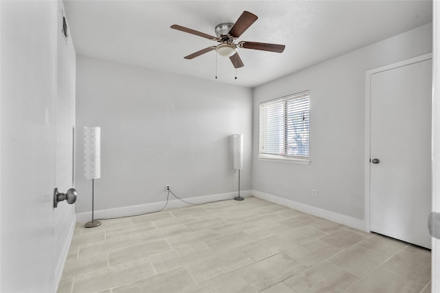 2219 Anthony Hay Ln, Katy, TX 77449 - spare room featuring baseboards and ceiling fan