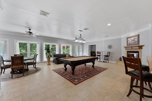 37922 Clubhouse Ln, Magnolia, TX 77355 - recreation room with crown molding, billiards table, a tile fireplace, a ceiling fan, and recessed lighting