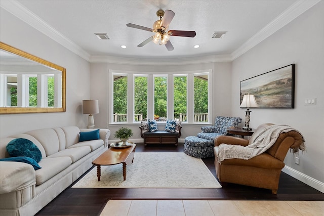 37922 Clubhouse Ln, Magnolia, TX 77355 - living room featuring plenty of natural light, a ceiling fan, wood finished floors, baseboards, and ornamental molding