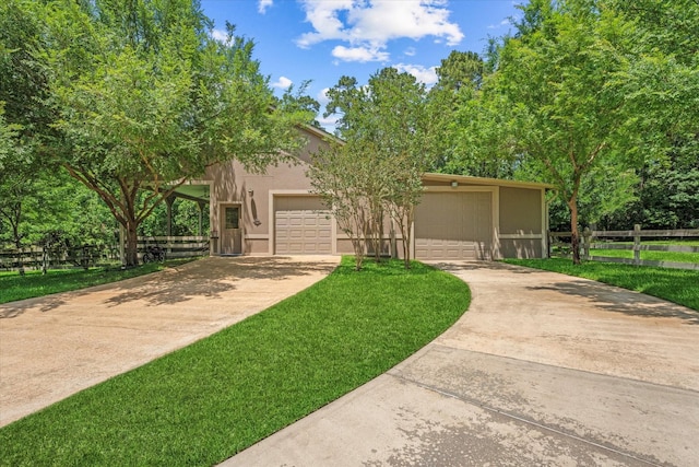 37922 Clubhouse Ln, Magnolia, TX 77355 - view of front of home with driveway and stucco siding