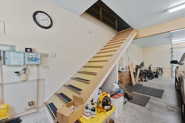 37922 Clubhouse Ln, Magnolia, TX 77355 - staircase featuring concrete floors