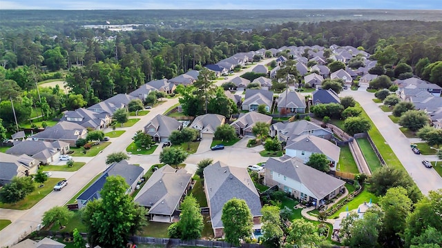 6 Muthill Cir, Conroe, TX 77304 - view of property location with nearby suburban area and a heavily wooded area