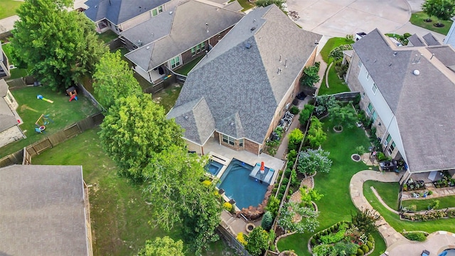 6 Muthill Cir, Conroe, TX 77304 - aerial perspective of suburban area with a pool area