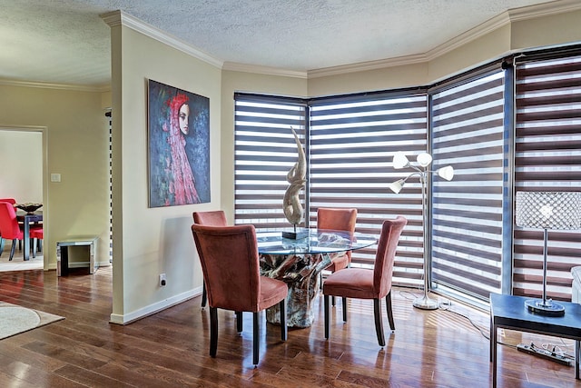 3350 Mccue Rd Unit 702, Houston, TX 77056 - dining area featuring wood-type flooring, a textured ceiling, baseboards, and ornamental molding