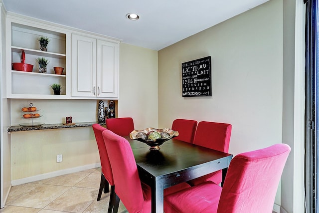 3350 Mccue Rd Unit 702, Houston, TX 77056 - dining area featuring recessed lighting, light tile patterned floors, and baseboards