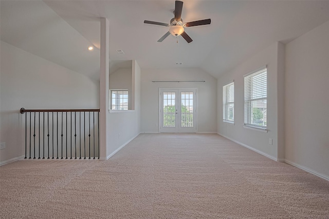 2822 Bluesage Bluff Dr, Richmond, TX 77406 - spare room featuring lofted ceiling, a ceiling fan, light colored carpet, and baseboards
