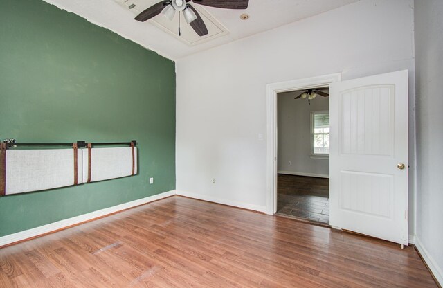 2711 Maury St, Houston, TX 77009 - empty room with a ceiling fan, wood finished floors, and baseboards