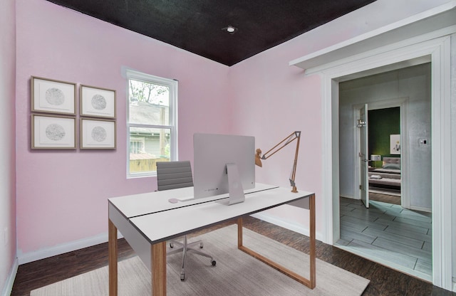 2711 Maury St, Houston, TX 77009 - office area with wood finished floors and baseboards