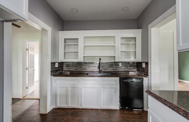 2711 Maury St, Houston, TX 77009 - kitchen featuring a sink, dishwasher, decorative backsplash, and white cabinetry