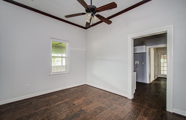 2711 Maury St, Houston, TX 77009 - spare room with crown molding, wood finished floors, a ceiling fan, and baseboards
