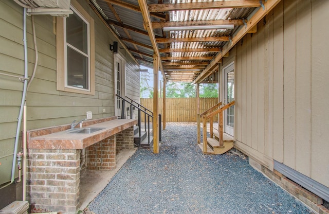 2711 Maury St, Houston, TX 77009 - view of patio with entry steps and fence