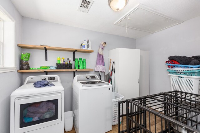 240 7th St, Trinity, TX 75862 - laundry area featuring attic access and independent washer and dryer