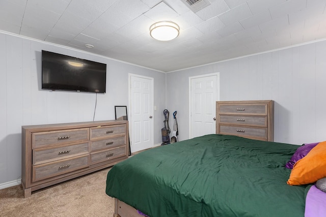 240 7th St, Trinity, TX 75862 - bedroom with carpet floors and ornamental molding