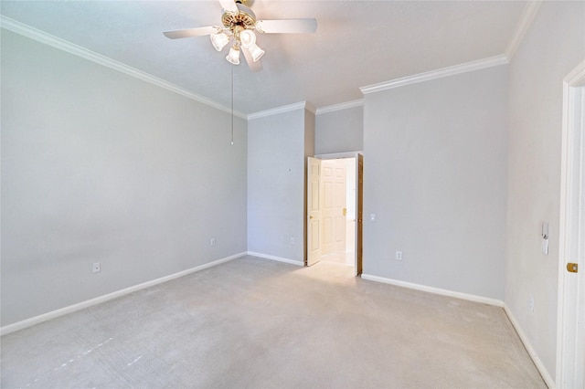 unfurnished bedroom featuring light carpet, baseboards, ornamental molding, and a ceiling fan