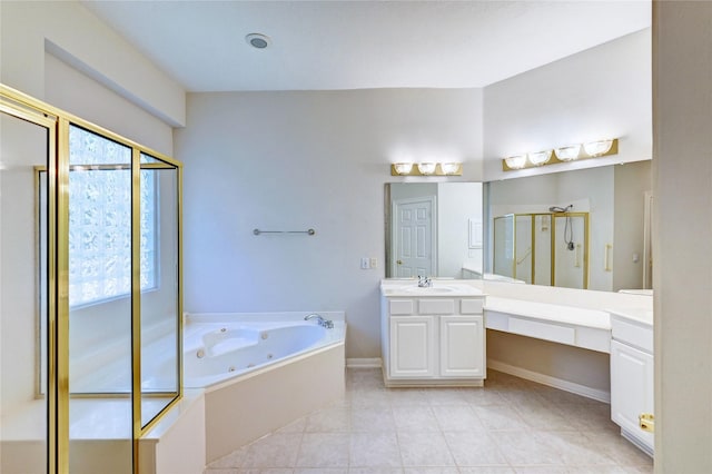 bathroom with a stall shower, a tub with jets, vanity, tile patterned floors, and baseboards