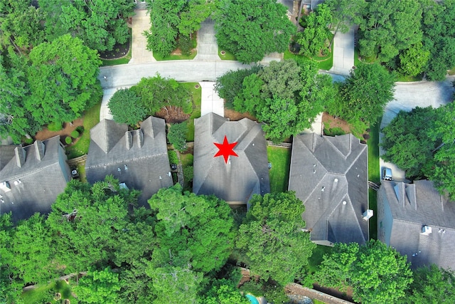 aerial view of property's location with nearby suburban area