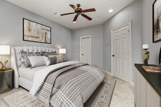 4609 Sharman St, Houston, TX 77009 - bedroom featuring light carpet, baseboards, ceiling fan, and recessed lighting