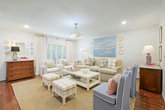 6475 Burgoyne Rd Unit 38, Houston, TX 77057 - living room featuring dark wood-style floors, a chandelier, and recessed lighting