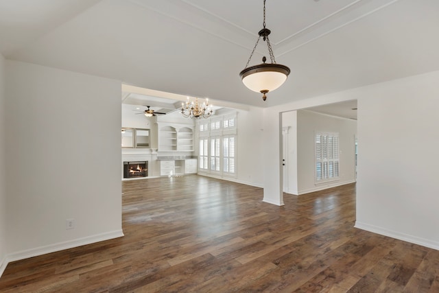 11623 Aspenway Dr, Houston, TX 77070 - unfurnished living room featuring ceiling fan, a chandelier, a lit fireplace, and dark wood finished floors