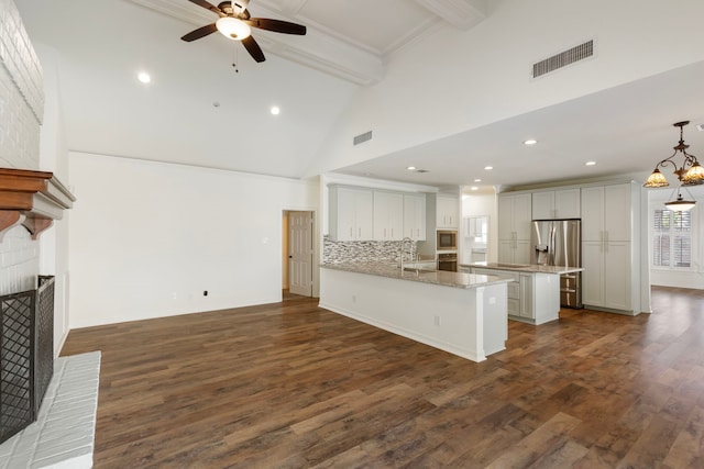11623 Aspenway Dr, Houston, TX 77070 - unfurnished living room featuring a fireplace, ceiling fan, dark wood-style flooring, high vaulted ceiling, and beam ceiling