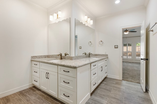 11623 Aspenway Dr, Houston, TX 77070 - full bathroom featuring double vanity, ceiling fan, baseboards, and ornamental molding