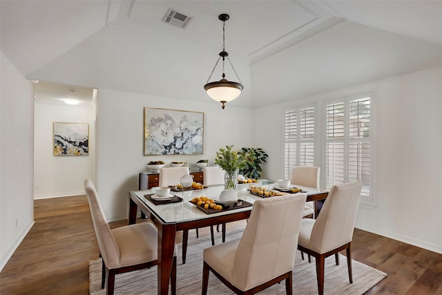 11623 Aspenway Dr, Houston, TX 77070 - dining room featuring lofted ceiling, dark wood finished floors, plenty of natural light, and baseboards