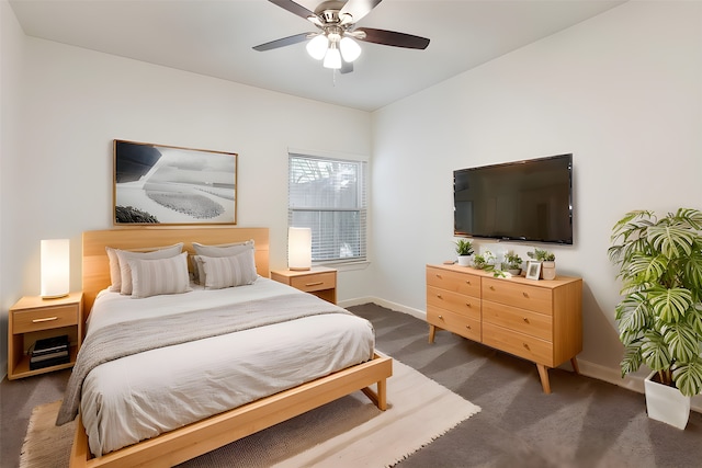 11623 Aspenway Dr, Houston, TX 77070 - bedroom featuring baseboards, dark carpet, and ceiling fan