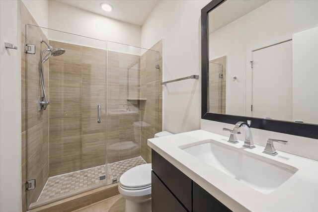 1704 Alamo St Unit A, Houston, TX 77007 - full bath with toilet, a shower stall, vanity, and recessed lighting