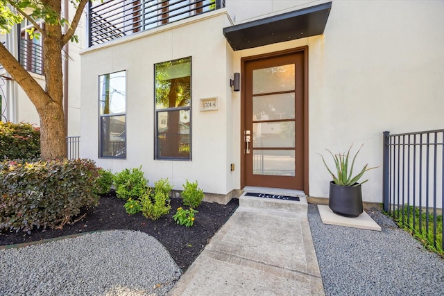 1704 Alamo St Unit A, Houston, TX 77007 - entrance to property with stucco siding and fence
