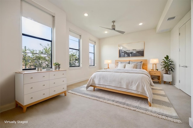 1704 Alamo St Unit A, Houston, TX 77007 - bedroom featuring light carpet, recessed lighting, baseboards, and ceiling fan