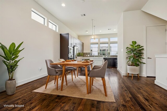 1704 Alamo St Unit A, Houston, TX 77007 - dining room featuring recessed lighting, dark wood-type flooring, and baseboards