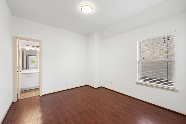 4603 Red Hawk Ct, Sugar Land, TX 77479 - unfurnished room with dark wood-style flooring and baseboards