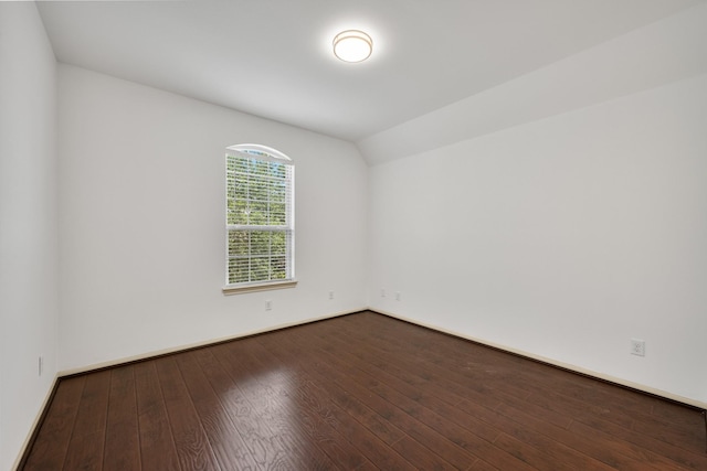 4603 Red Hawk Ct, Sugar Land, TX 77479 - unfurnished room with wood-type flooring, vaulted ceiling, and baseboards