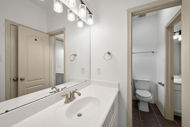 4603 Red Hawk Ct, Sugar Land, TX 77479 - bathroom featuring tile patterned floors, vanity, and toilet